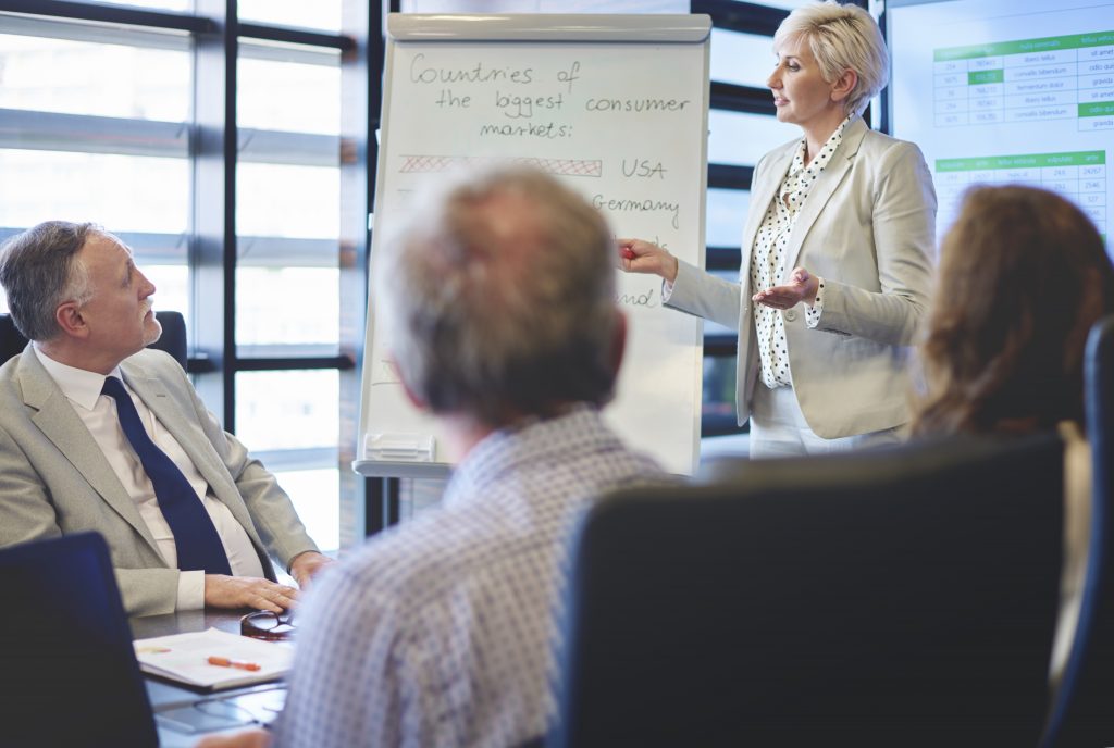 Business woman guiding in business meeting